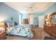 Light and bright bedroom features carpeted floors and en suite bathroom at 170 Glenwood Dr., Conway, SC 29526