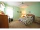Comfortable bedroom has a light green paint color and a ceiling fan at 170 Glenwood Dr., Conway, SC 29526