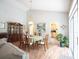 Dining room with hardwood floors, large windows, and decor that create an inviting space for meals and gatherings at 170 Glenwood Dr., Conway, SC 29526