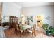 Dining room features a beautiful chandelier, and adjacent to an eat-in kitchen, providing an open and inviting space at 170 Glenwood Dr., Conway, SC 29526