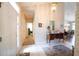 Hallway with tile flooring, traditional wallpaper, and views to an adjacent dining area at 170 Glenwood Dr., Conway, SC 29526