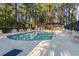 Community pool with lounge chairs and shaded areas for relaxing poolside at 170 Glenwood Dr., Conway, SC 29526