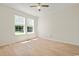 Bedroom featuring wood-look flooring and bright windows at 1763 Lipscomb Rd., Mullins, SC 29574