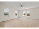 Spacious living room featuring neutral walls and light wood flooring, illuminated by natural light at 1763 Lipscomb Rd., Mullins, SC 29574