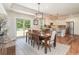 Cozy dining area with outdoor access, creating a seamless transition to a beautiful outdoor pool at 193 Field Loop Rd., Georgetown, SC 29440