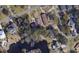 Aerial view of the property's location in a quiet residential neighborhood near a pond at 2010 Ye Olde Kings Hwy., North Myrtle Beach, SC 29582