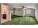 A spacious bedroom with two ceiling fans and an attached bathroom at 2010 Ye Olde Kings Hwy., North Myrtle Beach, SC 29582