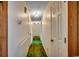 Hallway featuring neutral walls, multiple doors, and a long narrow design at 2010 Ye Olde Kings Hwy., North Myrtle Beach, SC 29582