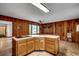 View of kitchen showcasing an island with a cooktop, plenty of drawer space, and a window at 2010 Ye Olde Kings Hwy., North Myrtle Beach, SC 29582