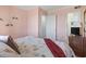 Comfortable bedroom featuring a patterned bedspread and access to the bathroom at 206 2Nd Ave. N # 271, North Myrtle Beach, SC 29582