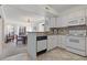 Open concept kitchen with stainless steel appliances and breakfast bar at 206 2Nd Ave. N # 271, North Myrtle Beach, SC 29582