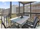 Secluded patio with a table and seating, great for relaxing and enjoying the neighborhood view at 206 2Nd Ave. N # 271, North Myrtle Beach, SC 29582