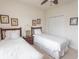 Bright bedroom with two twin beds, a ceiling fan, neutral walls, and a closet at 2241 Waterview Dr. # 315, North Myrtle Beach, SC 29582