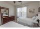 Bright bedroom with two twin beds, dark wood furniture, neutral walls, and a window view at 2241 Waterview Dr. # 315, North Myrtle Beach, SC 29582