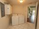 Bright laundry room featuring modern appliances and easy access to the living area at 2241 Waterview Dr. # 315, North Myrtle Beach, SC 29582