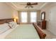 Bedroom with a ceiling fan, a comfortable bed, a dresser, and a mirror in the corner of the room at 2241 Waterview Dr. # 315, North Myrtle Beach, SC 29582
