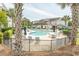 Beautiful community pool with shaded seating, palm trees, and nearby condo buildings at 2241 Waterview Dr. # 315, North Myrtle Beach, SC 29582