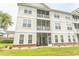 Rear view of a beautiful condo building with screened patios at 2241 Waterview Dr. # 315, North Myrtle Beach, SC 29582