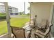 Relaxing screened porch with comfortable seating and views of green common areas at 2241 Waterview Dr. # 315, North Myrtle Beach, SC 29582