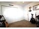 Cozy carpeted bedroom with a large closet and decorated with musical instruments at 233 Oak Lea Dr., Conway, SC 29526