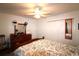 Spacious bedroom with a queen bed, wooden dresser, and ample closet space at 233 Oak Lea Dr., Conway, SC 29526