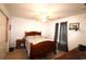 Warm and inviting bedroom with a comfortable bed, side table, and closet for storage at 233 Oak Lea Dr., Conway, SC 29526