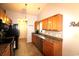 Functional kitchen featuring wooden cabinets, modern appliances, and ample counter space for meal preparation at 233 Oak Lea Dr., Conway, SC 29526
