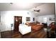 Bright living room featuring vaulted ceilings, hardwood floors, and a comfortable seating area with a ceiling fan at 233 Oak Lea Dr., Conway, SC 29526