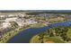 A distant aerial view of a cityscape with a lake and surrounding neighborhoods at 2492 Goldfinch Dr., Myrtle Beach, SC 29577