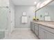 Bright bathroom boasts a walk-in shower, large vanity, and stylish fixtures at 2492 Goldfinch Dr., Myrtle Beach, SC 29577