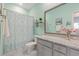 Fresh bathroom has stylish shower curtain, granite counters, and decorative accessories at 2492 Goldfinch Dr., Myrtle Beach, SC 29577