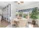 Charming breakfast nook features a wooden table, seating for four, and scenic outdoor views at 2492 Goldfinch Dr., Myrtle Beach, SC 29577