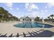 Community pool with modern pool house and lounge chairs at 2492 Goldfinch Dr., Myrtle Beach, SC 29577