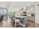 Modern kitchen featuring granite countertops, stainless steel appliances, and a large island with barstool seating at 2492 Goldfinch Dr., Myrtle Beach, SC 29577