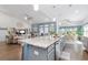 Stylish kitchen with a granite-top island and stainless steel appliances, open to the living area at 2492 Goldfinch Dr., Myrtle Beach, SC 29577