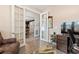 Office space featuring french doors, a workstation, and views into an adjacent dining room at 2492 Goldfinch Dr., Myrtle Beach, SC 29577