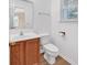 Half bath featuring vanity, toilet, window, and modern fixtures at 2546 Whetstone Ln., Myrtle Beach, SC 29579