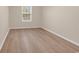 Bedroom featuring vinyl floors, neutral paint, and natural lighting at 2546 Whetstone Ln., Myrtle Beach, SC 29579