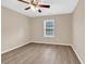 Neutral bedroom featuring luxury vinyl plank flooring, ceiling fan, and a window at 2546 Whetstone Ln., Myrtle Beach, SC 29579