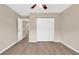 Bedroom with a ceiling fan, luxury vinyl plank flooring, and double closet doors at 2546 Whetstone Ln., Myrtle Beach, SC 29579