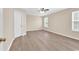 A spacious bedroom with modern flooring, neutral paint, and a ceiling fan for added comfort at 2546 Whetstone Ln., Myrtle Beach, SC 29579