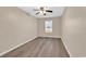 Spacious bedroom featuring vinyl floors, a ceiling fan, and natural lighting at 2546 Whetstone Ln., Myrtle Beach, SC 29579