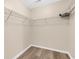 A walk-in closet featuring ample shelving and a hardwood floor at 2546 Whetstone Ln., Myrtle Beach, SC 29579