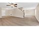 Large living room with laminate flooring and modern lighting, perfect for entertaining and relaxing at 2546 Whetstone Ln., Myrtle Beach, SC 29579