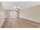Bright and airy living room featuring neutral walls and laminate flooring at 2546 Whetstone Ln., Myrtle Beach, SC 29579