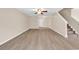 Inviting living room featuring new laminate flooring, neutral paint, and staircase at 2546 Whetstone Ln., Myrtle Beach, SC 29579