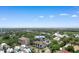 Aerial view of 307 74th Ave N residence surrounded by lush greenery and a nearby pool at 307 74Th Ave. N # 3C, Myrtle Beach, SC 29572