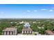 Aerial view of 307 74th Ave N surrounded by trees and lush landscapes in a residential neighborhood at 307 74Th Ave. N # 3C, Myrtle Beach, SC 29572