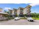 Beautiful condo building featuring multiple balconies and covered parking spaces in a coastal community at 307 74Th Ave. N # 3C, Myrtle Beach, SC 29572