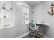 Cozy home office nook featuring built-in shelves, a small desk, and stylish nautical decor at 307 74Th Ave. N # 3C, Myrtle Beach, SC 29572